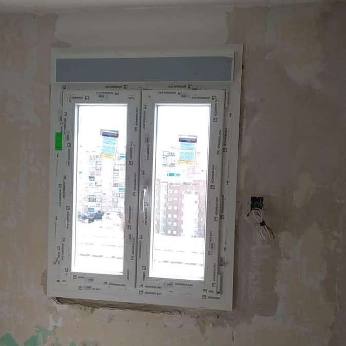 Instalación de ventana de PVC con persiana